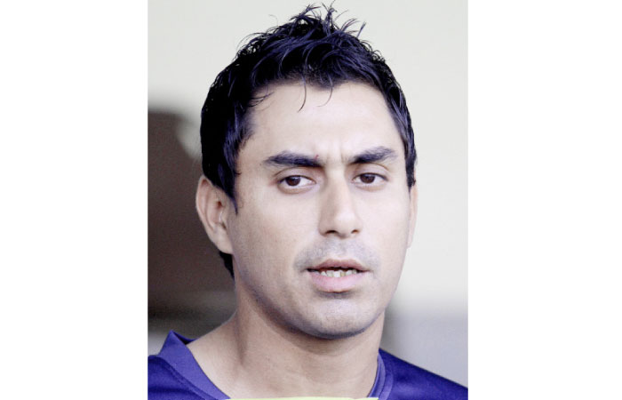 Pakistan cricketer Nasir Jamshed speaks during a press conference in Lahore, Pakistan. — AP