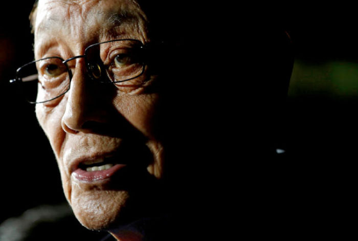 Former Philippine President Fidel Ramos speaks to journalists as he arrives at Hong Kong International Airport in this Aug. 8, 2016 file photo. — Reuters