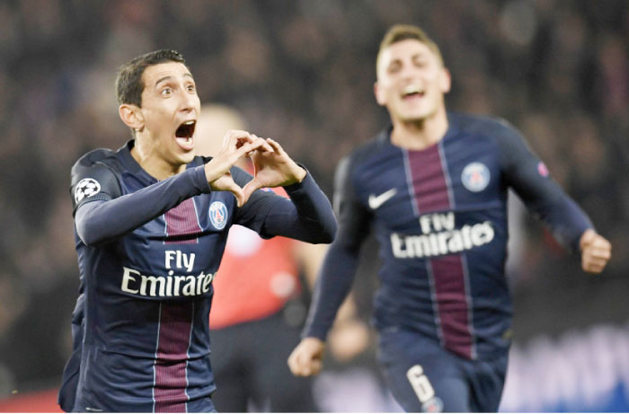 Paris Saint-Germain’s Angel Di Maria celebrates after scoring a goal during the UEFA Champions League round of 16 first leg football match against FC Barcelona at the Parc des Princes Stadium in Paris Tuesday. — AFP