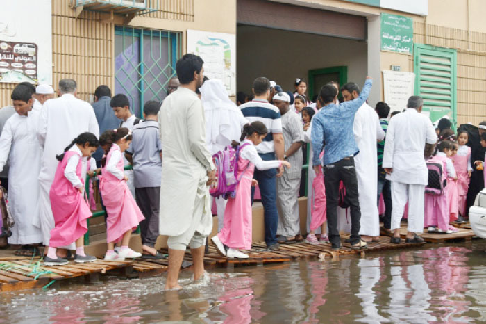 Makeshift pathway enables students to reach the school premises. — Courtesy photo