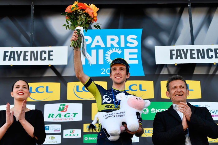 Stage winner Great Britain's Simon Yates celebrates on the podium after winning the 193,5 km sixth stage of the 75th edition of the Paris-Nice cycling race, between Aubagne and Fayence, Friday. — AFP