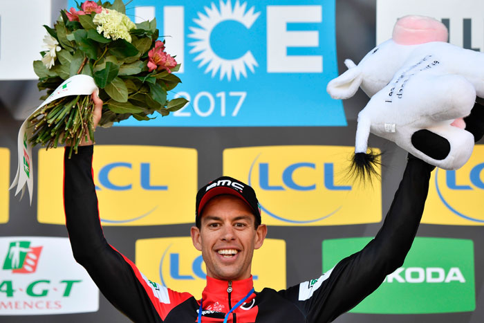 Stage winner Australia's Richie Porte celebrates on the podium after winning the 177 km seventh stage of the 75th edition of the Paris-Nice cycling race, between Nice and Col de la Couillole, Saturday. — AFP