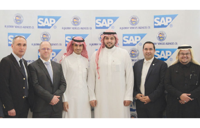 Group photo of executives of AL Jazirah Vehicles Agencies and SAP after the signing of accord