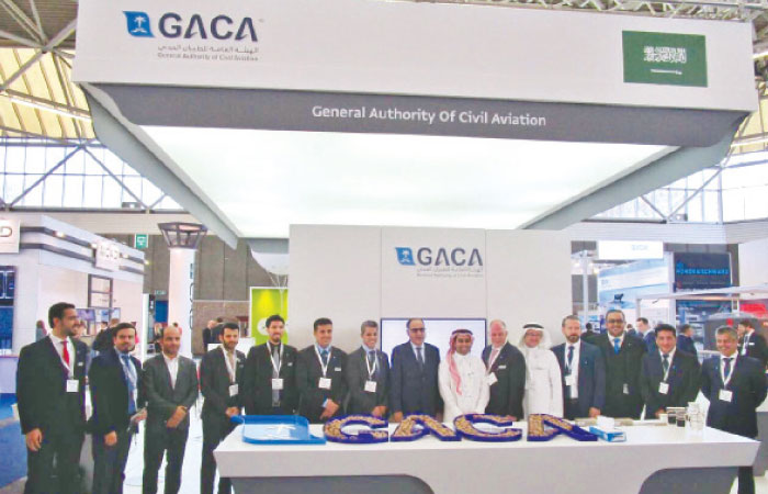 GACA officials and staff in front of GACA booth in Amsterdam