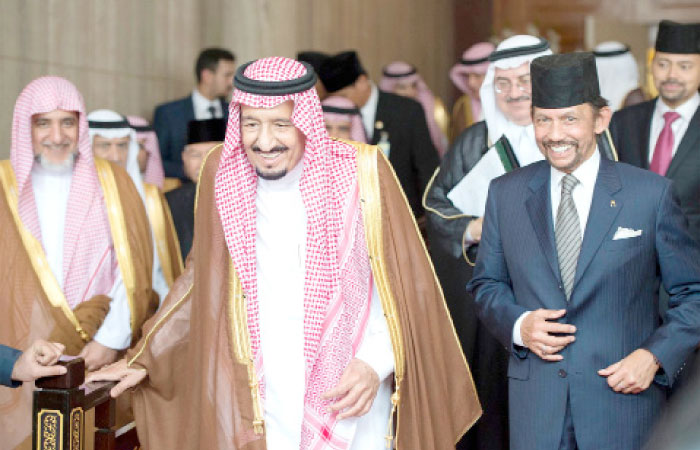 Custodian of the Two Holy Mosques King Salman being seen off at Brunei International Airport by Sultan Bolkiah and a number of officials on Saturday. — SPA