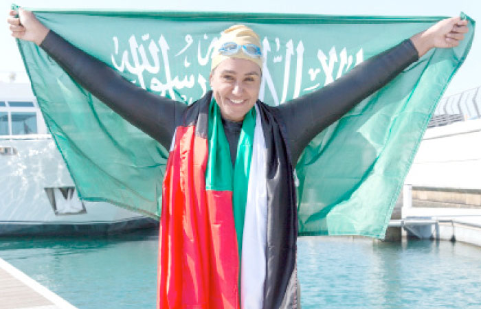 Dr. Mariam Saleh Binladen celebrates after achieving her rare feat. — Courtesy photo