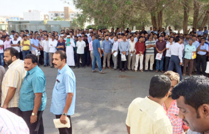 Crowds of applicants waiting to enter the Indian Consulate premises to voice their grievances at the open forum on Saturday.