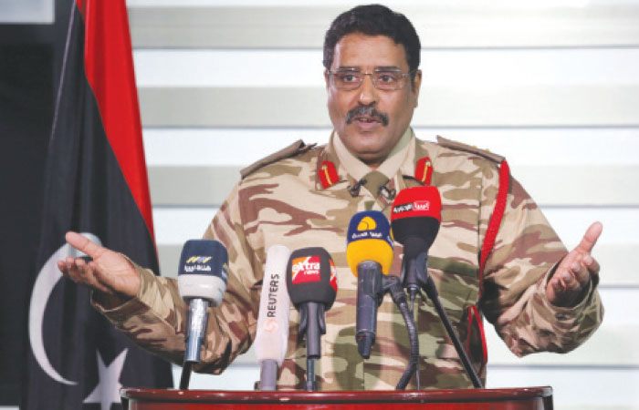 Spokesman of Libyan National Army (LNA) Col. Ahmad Al-Mismari gestures during a news conference in Benghazi, Libya. — Reuters