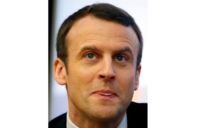 Emmanuel Macron, head of the political movement En Marche!, or Onwards !, and candidate for the 2017 French presidential election, attends a meeting at the National Assembly in Paris, France, on Wednesday. — Reuters