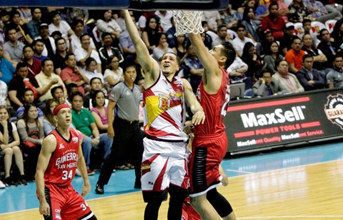 San Miguel Beer's Marcio Lassiter lays up, defying the defense of Ginebra's Japeth Aguilar in Game 4 of the 2017 PBA Philippine Cup Finals at the Smart-Araneta Coliseum Friday night.