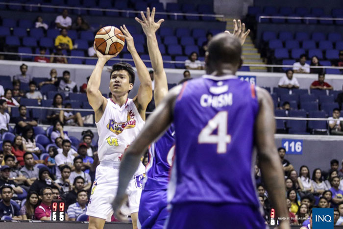 Rain or Shine’s James Yap fires a jumper past the outstretched hands of an NLEX defender in their PBA Commissioner’s Cup game at the Smart-Araneta Coliseum Friday night.