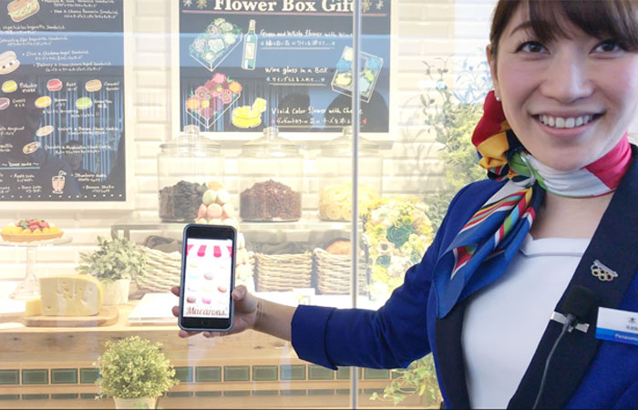 Demonstration of scanning information from a sweets shop’s window display. — SG photos