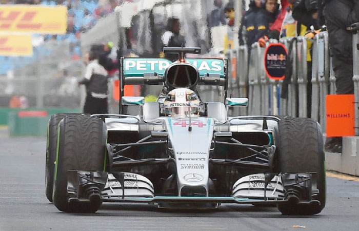 Mercedes British driver Lewis Hamilton motoring through the pits at the Formula One Australian Grand Prix in Melbourne Saturday. — Reuters