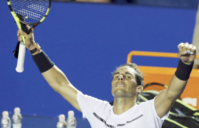 Spain’s Rafael Nadal celebrates after defeating Croatia’s Marini Cilic at the Mexican Tennis Open in Acapulco Friday. — AP