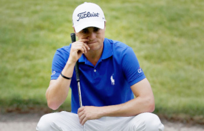 Justin Thomas of the US, prepares to putt on the 6th hole in round three of the Mexico Championship at Chapultepec Golf Club in Mexico City Saturday. — AP