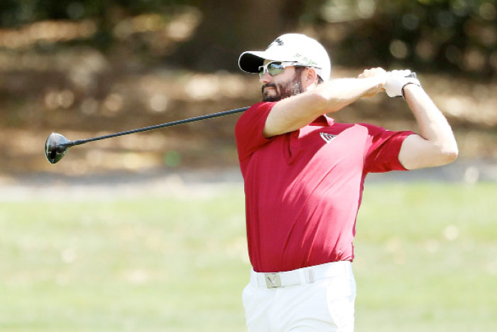 Adam Hadwin of Canada plays a shot during the third round of the Valspar Championship at Innisbrook Resort Copperhead Course in Palm Harbor, Florida, Saturday. — AFP