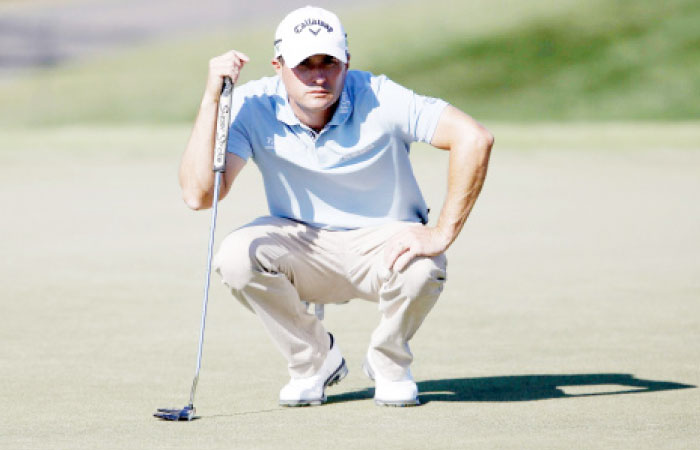 Kevin Kisner lines up a putt on the 16th green during the third round of the Arnold Palmer Invitational Golf Tournament at Bay Hill Club & Lodge in Orlando, Florida, Saturday. — Reuters