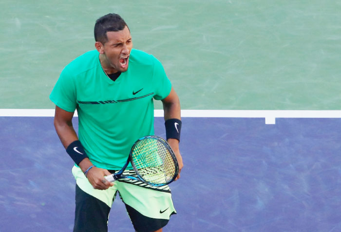 Nick Kyrgios of Australia celebrates match point against Novak Djokovic of Serbia in their fourth round match of the BNP Paribas Open at Indian Wells Wednesday. — AFP