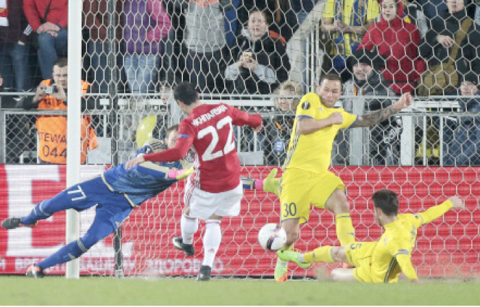 Manchester United’s Henrikh Mkhitaryan scores a goal against Rostov during their Europa League round of 16 first leg soccer match in Rostov-on-Don, Russia, Thursday.  — AP