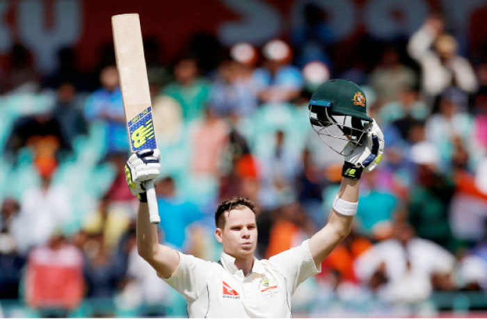 Australia’s captain Steven Smith celebrates his century. — Reuters