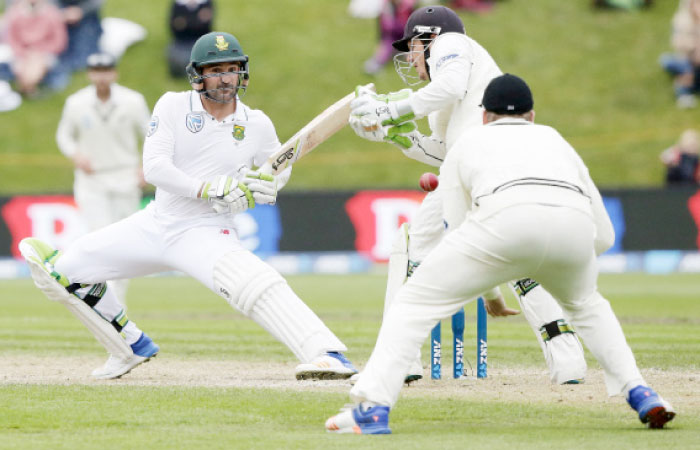 South Africa’s Dean Elgar watches the ball going past New Zealand wicketkeeper BJ Watling during the first cricket Test at University Oval, Dunedin, Friday. — AP