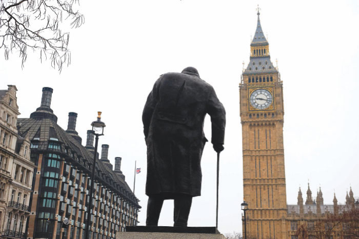 The statue of Winston Churchill is seen in Parliament Square opposite the Houses of Parliament in central London on Friday, two days after the terror attack. — AFP