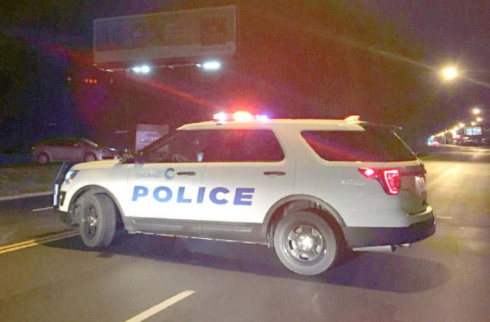 A police car blocks access to the scene of a mass shooting at the Cameo Nightlife club in Cincinatti, Ohio, on Sunday. — Reuters