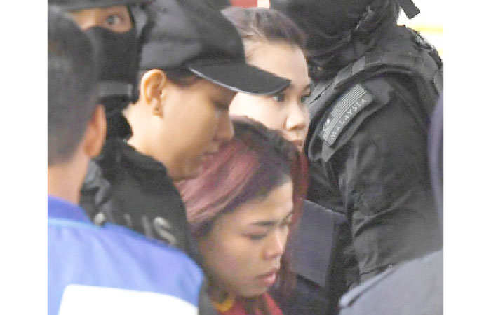 Indonesian Siti Aisyah arrives at a court in the suburbs of Kuala Lumpur, Malaysia, on Wednesday. — Reuters