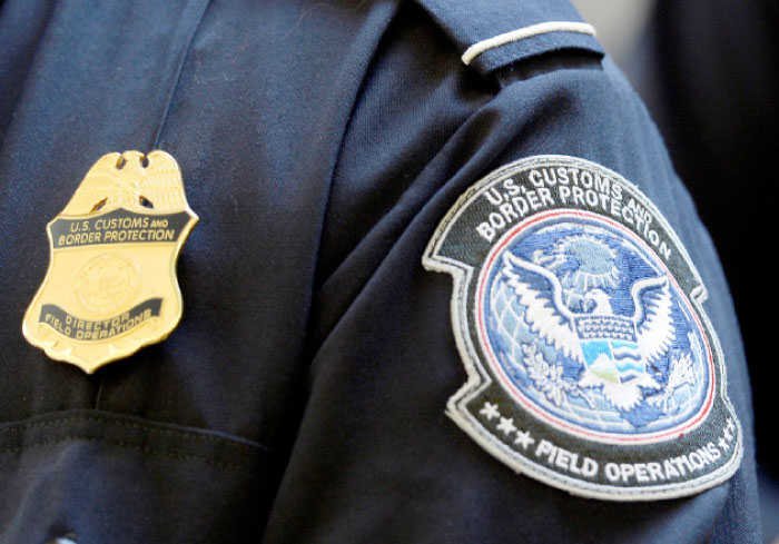 A US Customs and Border Protection arm patch and badge is seen at Los Angeles International Airport, California, in this Feb. 20, 2014 file photo. — Reuters