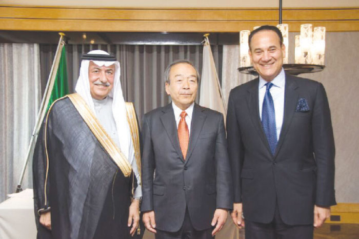 From left: Dr. ibrahim Al-Assaf, Takeshi Uchiyamada, and Eng. Mohammed Jameel