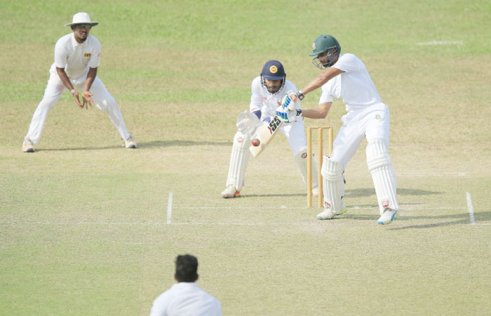 Bangladeshi batsman Mohammad Mahmudullah plays a shot during their practice match with Sri Lanka Cricket President’s IX in Moratuwa in this picture. — AP