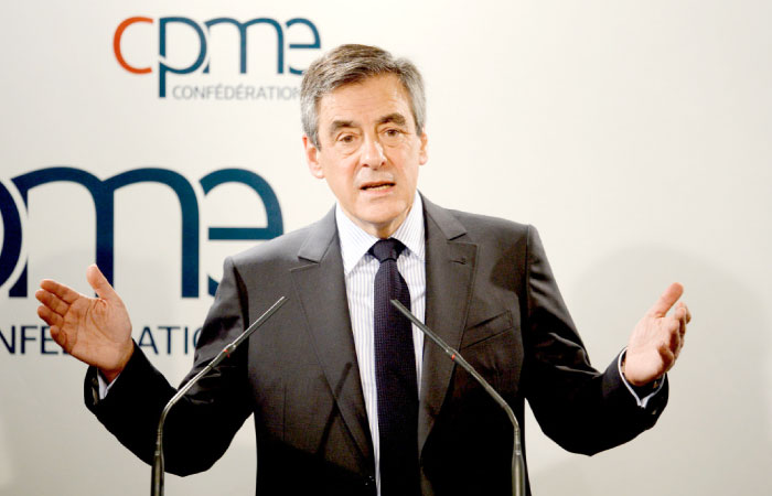 French presidential election candidate for the right-wing Les Republicains (LR) party Francois Fillon speaks during a debate at the French Confederation of Small and Medium-Sized Enterprises (CPME) union›s headquarters in Puteaux, west of Paris, on Monday. — AFP