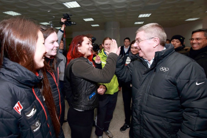 This handout photo provided by the Pyeongchang Organizing Committee for the 2018 Olympic and Paralympic Winter Games (POCOG) shows International Olympic Committee President Thomas Bach (R) visiting the athletes’ village under constructions in Pyeongchang. — AFP