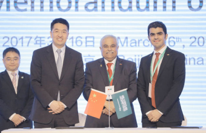 Ramadan Ding, CEO of Huawei Tech Investment Saudi Arabia; and Khalid Al Abdulkarim, CEO of Industrial Systems Group (second and third from left, respectively) during the announcement of accord