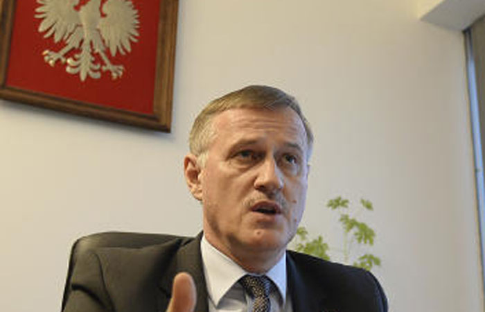 Prosecutor Andrzej Pozorski speaks during an interview with The Associated Press in Warsaw, Poland, Monday, March 13, 2017. Pozorski said that Poland will seek the arrest and extradition of a Minnesota man identified as a Nazi-era commander of an SS-led unit that burned Polish villages and killed civilians in World War II. The man has been exposed by the AP as 98-year-old Michael Karkoc. — AP