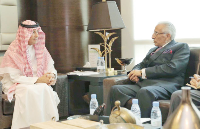 Special Assistant to Pakistan Prime Minister Syed Tariq Fatemi meets with Minister for Labor and Social Development Ali Al-Ghafis in Riyadh on Wednesday. — Courtesy photo