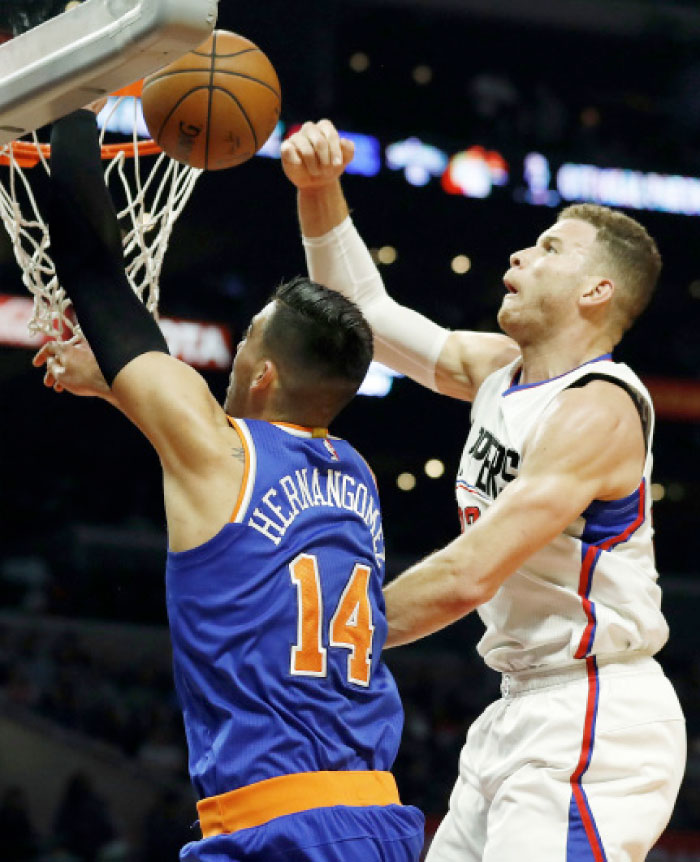 Los Angeles Clippers forward Blake Griffin, right, blocks a shot by New York Knicks center Willy Hernangomez during the second half of an NBA game, Monday, in Los Angeles. — AP