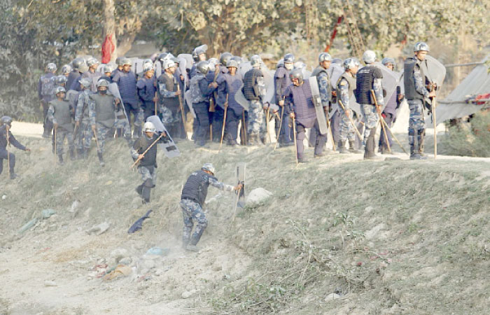 Nepalese police clah with Madhesi minority protesters at Raibiraj, Saptari District, some 240 km southeast of Kathmandu, on Monday. — AFP