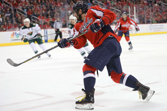Alex Ovechkin of the Washington Capitals scores a goal against the Minnesota Wild during their NHL game at Verizon Center in Washington Tuesday. — AFP