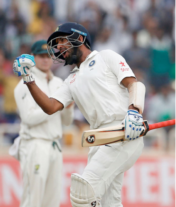 India’s Cheteshwar Pujara celebrates his double century. — Reuters