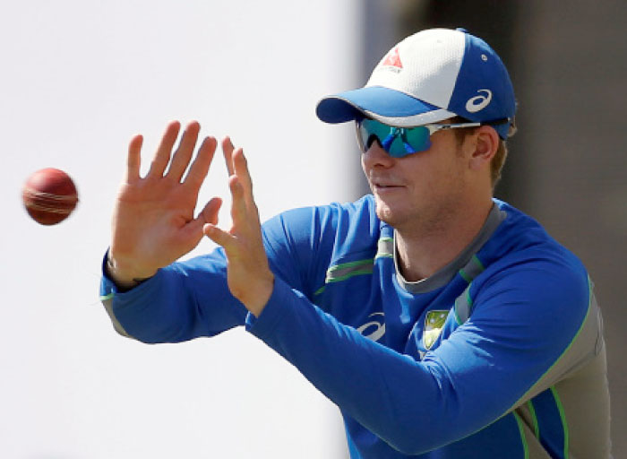 Australia’s captain Steve Smith catches the ball during a training session at Jharkhand State Cricket Association Stadium, Ranchi, India, Wednesday. — Reuters