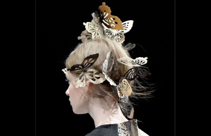 A model presents a creation from Hanae Mori by Japanese designer Yu Amatsu during the 2017 Autumn/Winter Collection show of the Tokyo Fashion Week  in Tokyo. - AFP