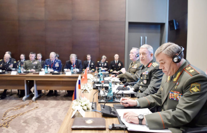 Turkey’s Chief of Staff General Hulusi Akar, US Chairman of the Joint Chiefs of Staff Joseph Dunford and Russian Armed Forces Chief of Staff Valery Gerasimov meet in Antalya, Turkey, Tuesday. — Reuters