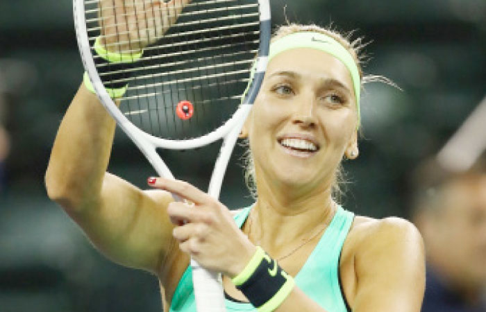 Elena Vesnina of Russia celebrates after her straight sets victory over Angelique Kerber of Germany at the BNP Paribas Open at Indian Wells Tuesday. — AFP