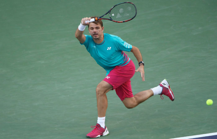 Stanislas Wawrinka of Switzerland plays a forehand against Philipp Kohlschreiber of Germany in their third round match during day eight of the BNP Paribas Open at Indian Wells Tennis Garden on Monday. — AFP