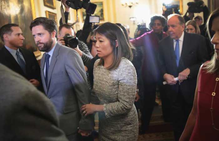 Crystal Dao Pepper, the daughter of Dr. David Dao, leaves a press conference in Chicago, Illinois, in this April 13, 2017 file photo. — AFP