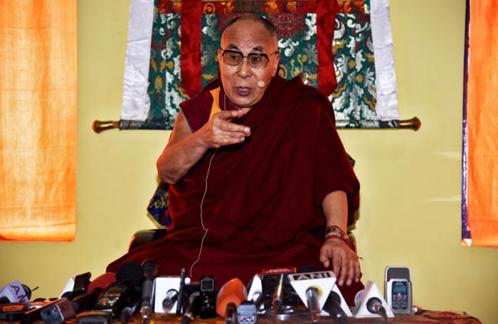Tibetan spiritual leader Dalai Lama speaks at a press conference after delivering teachings at Yiga Choezin, in Tawang, in the northeastern state of Arunachal Pradesh, India, on Saturday. — Reuters