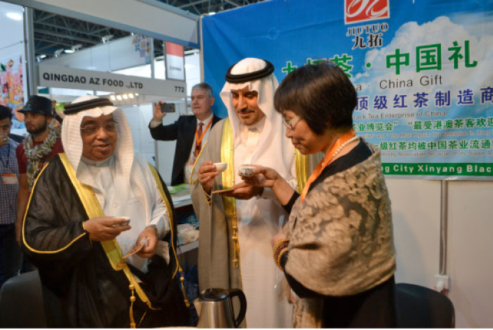 Mohammad bin Abdullah Al-Omari (middle), Director General of the Saudi Commission for Tourism and National Heritage - Makkah Region, tours the expo after the inauguration ceremony