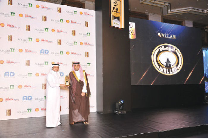 Fahad Al Wallan, Executive of Wallan Trading Company, receives the award from  Prince Bandar Bin Sultan Al-Faisal, President of Saudi Arabia Motor Federation