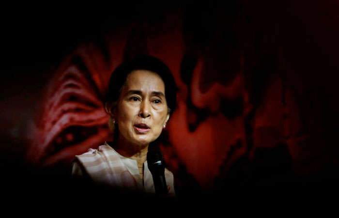 Myanmar's opposition leader Aung San Suu Kyi speaks to the Myanmar community living in Singapore. — Reuters